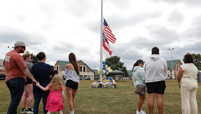 Shackled before grieving relatives, father, son face judge in Georgia school shooting