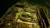 Divers find 100 bottles of 'royal' champagne on 19th-century shipwreck