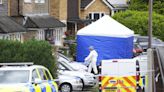 UK police are searching for man armed with crossbow after 3 women were killed in a home near London