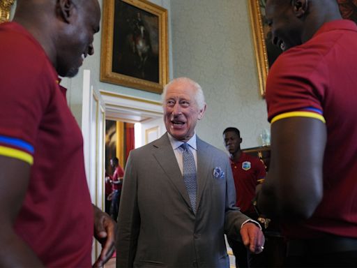 King Charles learns new handshake from West Indies cricket players