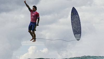 Right place, right time: The story behind the viral surfing photo from the Paris Olympics