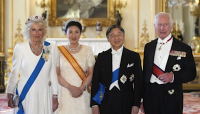 Queen wears the King Charles III Family Order for first time at state banquet