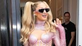 Paris Hilton Has a Barbie Moment in a Sparkly Pink Mini While Leaving Her Brussels Hotel