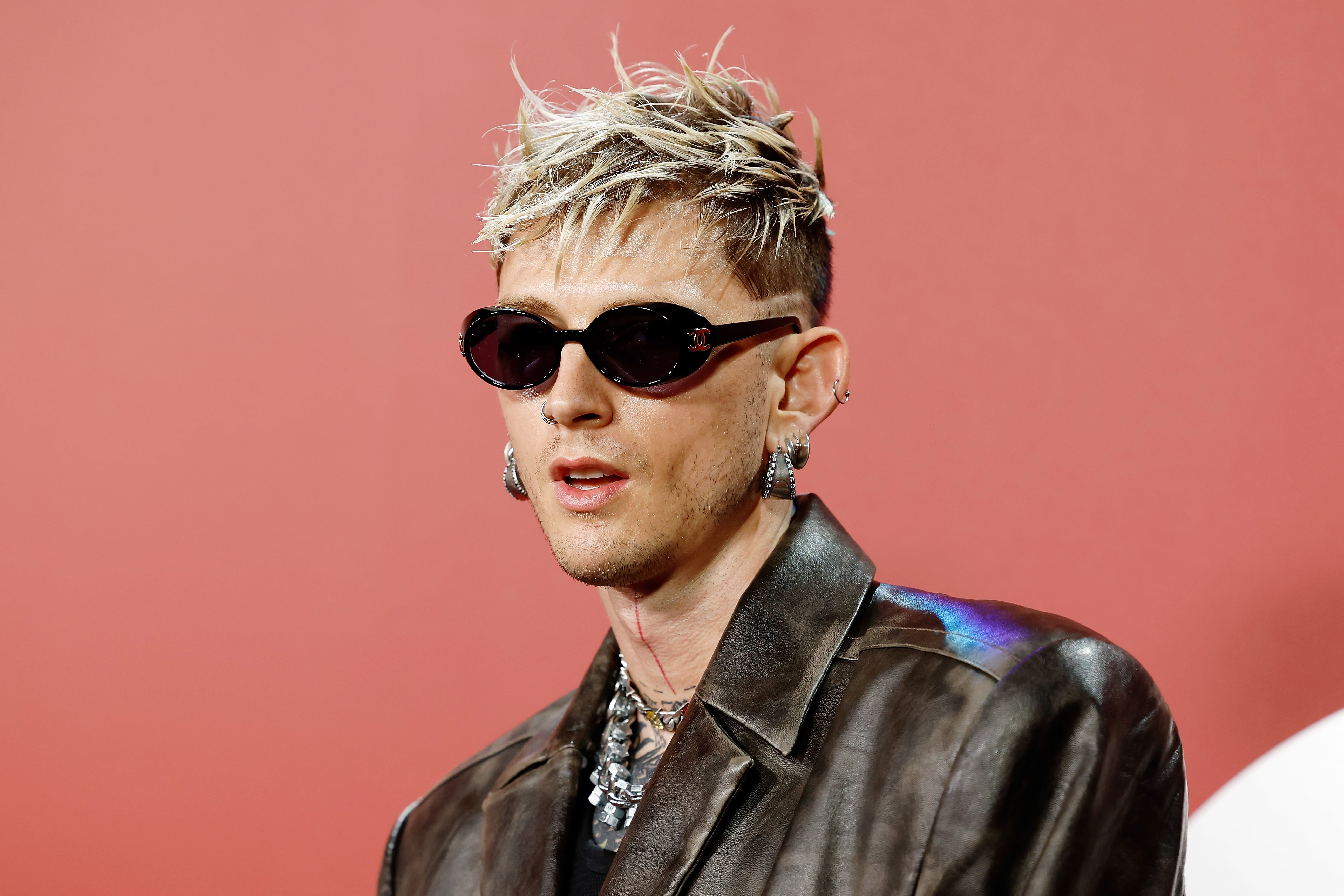 MGK Enlists Jelly Roll for John Denver-Inspired New Single ‘Lonely Road’