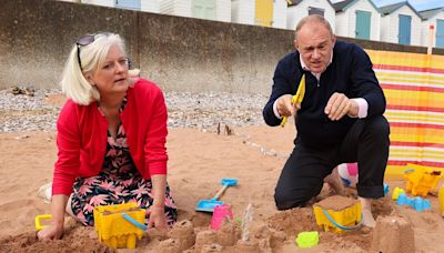 Sir Ed Davey builds sandcastles after being slammed for 'buffoonery'