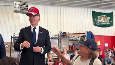 WATCH: Biden Yucks It Up With a Trump Supporter And Eventually Puts On His MAGA Hat