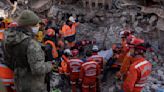 Turkey detains building contractors as quake deaths pass 33,000