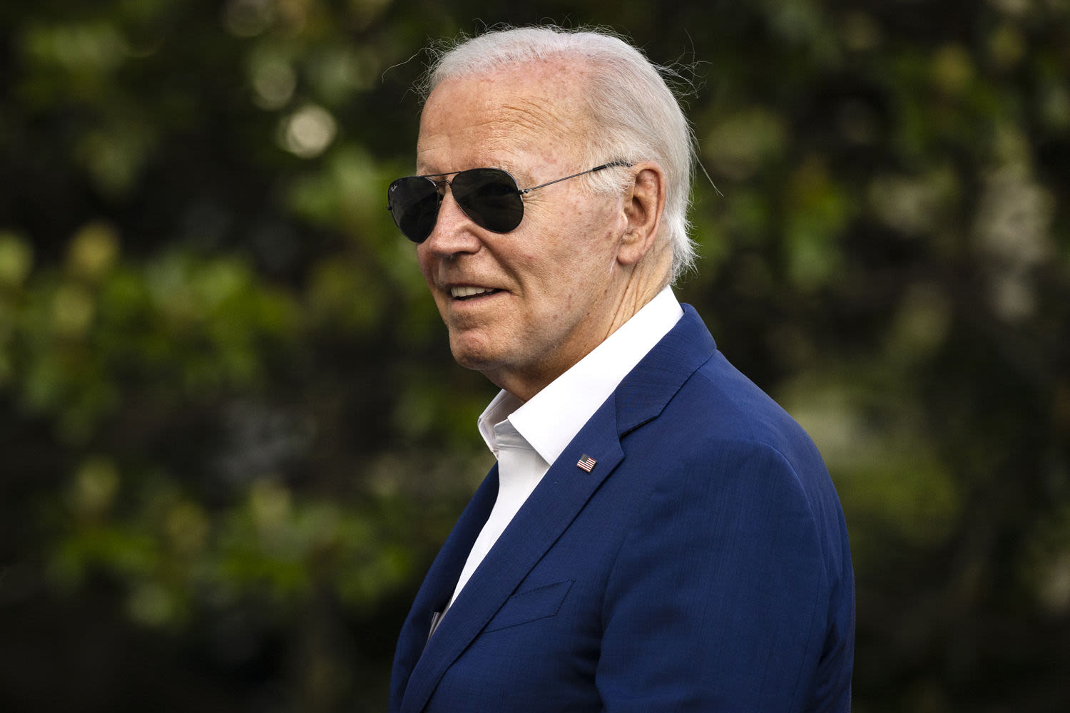 Biden assails Democratic elites as he fights to remain in the race