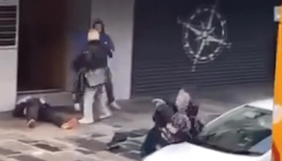 Moment pair brutally attacked in broad daylight on busy Scots street