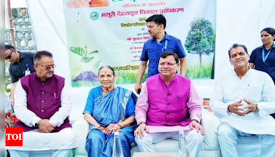 Uttarakhand CM Pushkar Singh Dhami plants sapling with his mother on Guru Purnima | Dehradun News - Times of India