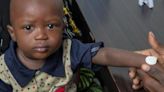 Gambian child receives the microarray patch