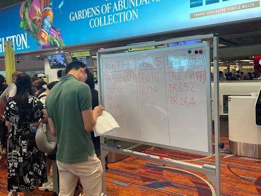 Some airports were forced to use whiteboards to handwrite flight information due to the global IT outage