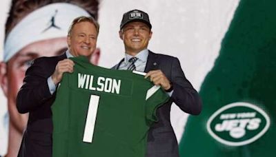 Jets trade quarterback Zach Wilson to the Broncos, AP source says