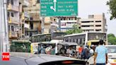 Garbage piles up by this road, vehicles move at snail’s pace | Noida News - Times of India