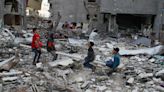 Children play in rubble of Gaza for Eid holiday