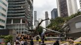 One killed, another injured after tree falls on road, monorail track along KL’s Jalan Sultan Ismail (VIDEO)