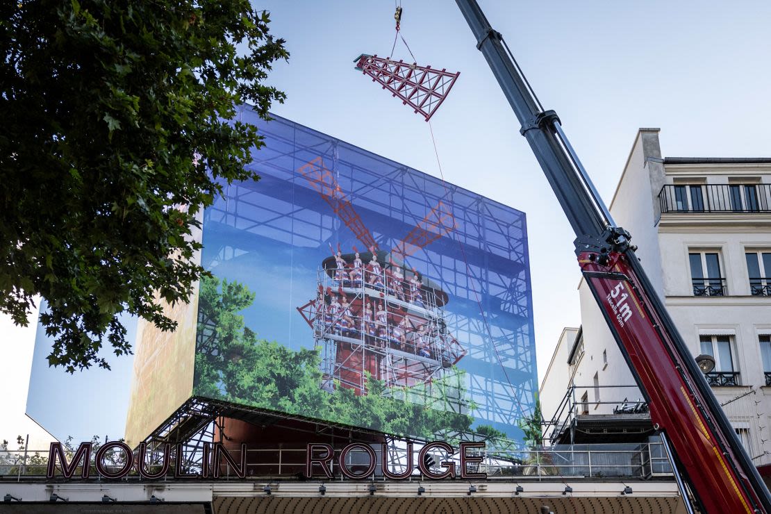 Paris’ famous Moulin Rouge windmill gets its blades back | CNN