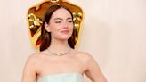 Emma Stone Wears a Dramatic Peplum Gown by Louis Vuitton at the 2024 Oscars