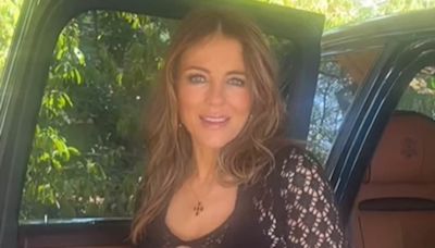 Elizabeth Hurley turns heads in a see-through crochet dress