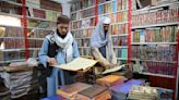 Phones, Islamic books and currency exchange. Some businesses are making money out of Taliban rule