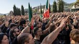 Thousands commemorate Mussolini's rise as far-right sentiments continue to sweep across Europe