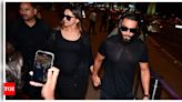 Ranveer Singh gets protective of pregnant wife Deepika Padukone amidst media frenzy as they jet out of city post 'Kalki 2898 AD' event - WATCH | - Times of India