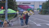 Boeing locks out its private firefighters around Seattle over pay dispute; Union pickets in front of Renton facility