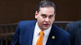 Rep. George Santos thanked a lawmaker for 'stopping by' for a chat. The lawmaker said this was a lie, and that he went to protest and ask for his resignation.