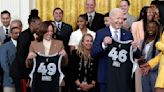 .... President Joe Biden and Vice President...Harris are presented jerseys as they welcome the Las Vegas Aces...their record-breaking season and victory in the 2023 WNBA Finals in the East...
