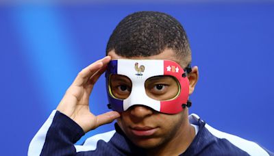 Why is Kylian Mbappe wearing a mask against Spain at Euro 2024?