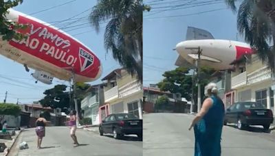 Watch a Blimp Crash Into a Residential Neighborhood