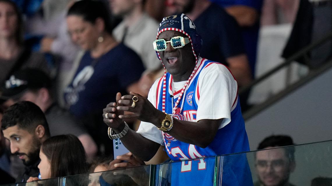 Flavor Flav meets with FLOTUS Jill Biden during US women’s water polo match