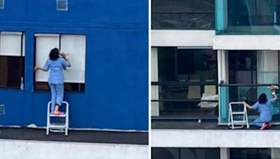 [Video] Mujer arriesgó su vida por limpiar ventanas desde un piso 23 en Bogotá