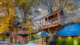 An Arkansas man spent 2 years building a treehouse as a retirement project. He's listing it for $1.25 million, and it comes with a heated pool and a swinging bridge — check it out.