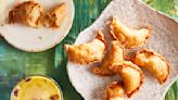 Celebrate Holi with crispy fried samosas and gujiyas