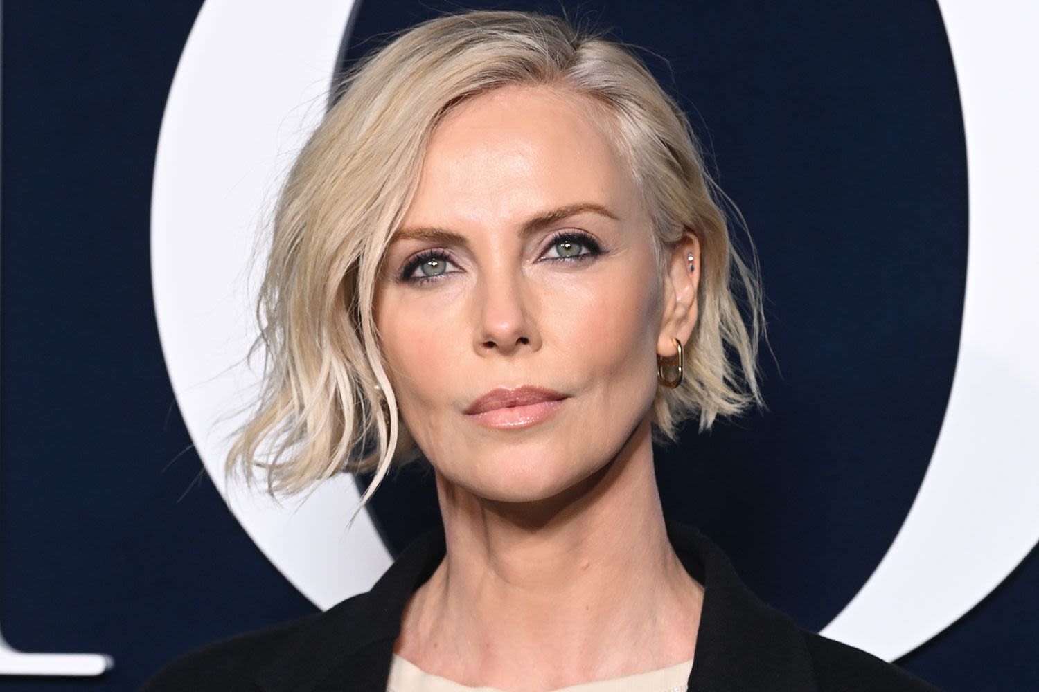 Charlize Theron Opens Up About 'Badass' Mom Who Searches for Daughter in New Her Netflix Doc“ Into the Fire” (Exclusive)