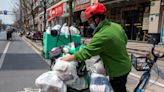 Food-delivery drivers in Shanghai forced to become homeless as the city's draconian lockdown means they can't enter their homes
