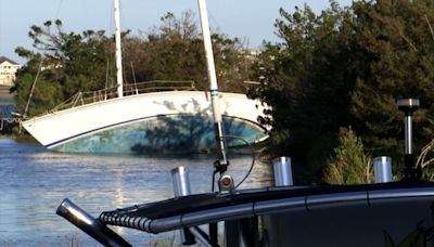 ‘Ornament of the Inlet’ sailboat removed after 2 years on Murrells Inlet mudflat, then quickly sinks