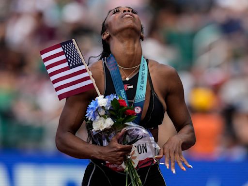 Hurdler Alaysha Johnson earns spot to Paris Games wearing borrowed spikes and uniform she designed