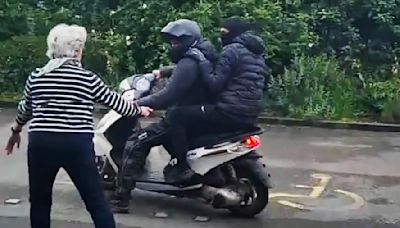 Old women chase off hammer-wielding thugs trying to steal a motorbike
