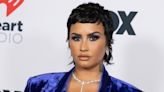 Demi Lovato says her team once 'barricaded' her into hotel room to control her eating