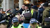 Tommy Robinson charged after attending anti-Semitism march