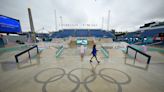 Pouring rain disrupts Games after drenched opening ceremony