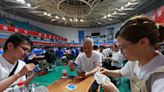 In China, poker is out, while 'throwing eggs' is in