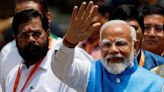 India's Modi denies stoking divisions to win election, files nomination