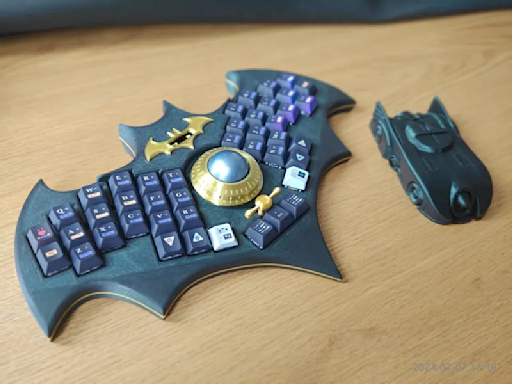 Mechanical keyboard shaped like the Batman symbol