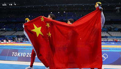 More Chinese swimmers secretly tested positive, blamed hamburgers: Report