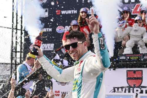 Denny Hamlin holds off Larson late to win NASCAR Cup race at Dover Motor Speedway