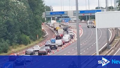 Two police among four in hospital after multi-car crash closes M8