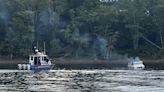 Water rescue crews extinguish boat fire in Campbell County, 5 people were on board